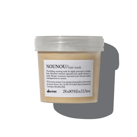 Jar of NOUNOU hair mask with a white label on a white background